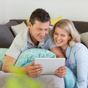 happy couple f-secure vpn tablet freedome